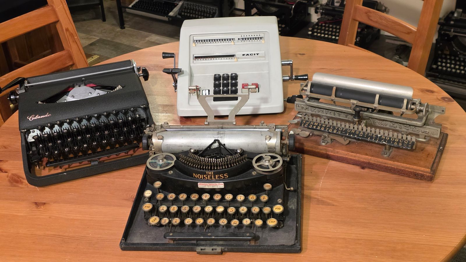 Calanda, Noiseless Portable, and Merritt typewriters and Facit CM2-16 calculator