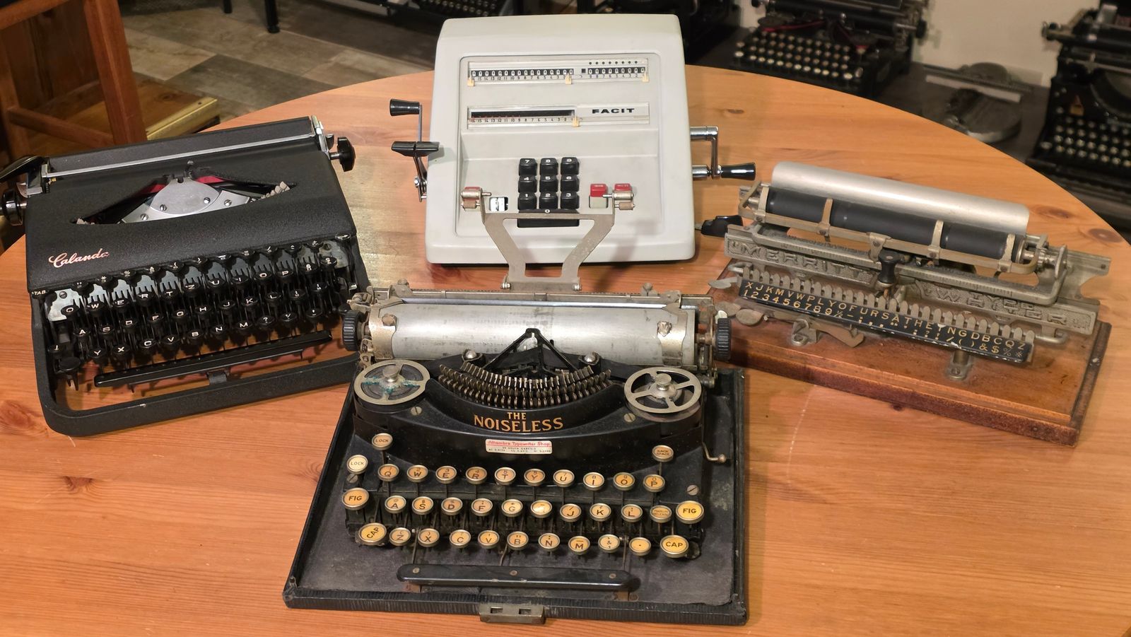 Calanda, Noiseless Portable, and Merritt typewriters and Facit CM2-16 calculator,